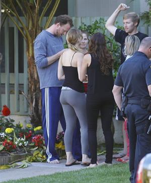 Jennifer Lawrence in Santa Monica helping a woman who fainted on June 25, 2012 