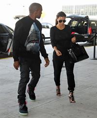 Kim Kardashian and Kanye West JFK airport in New York - 09 August 2012 