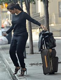 Kim Kardashian and Kanye West JFK airport in New York - 09 August 2012 