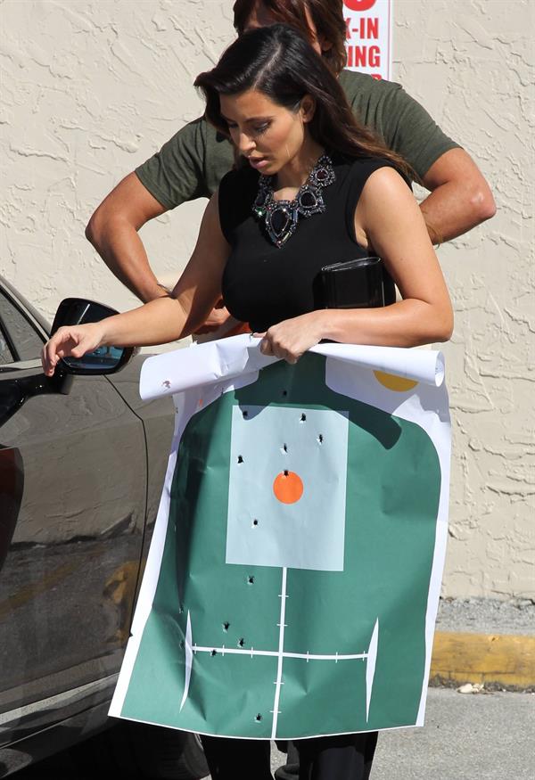 Kim Kardashian Spending the afternoon at the range with friend Jonathan Cheban in Miami (November 2, 2012) 