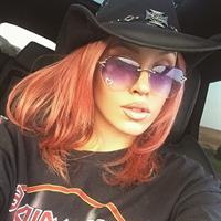 Imogen Anthony taking a selfie