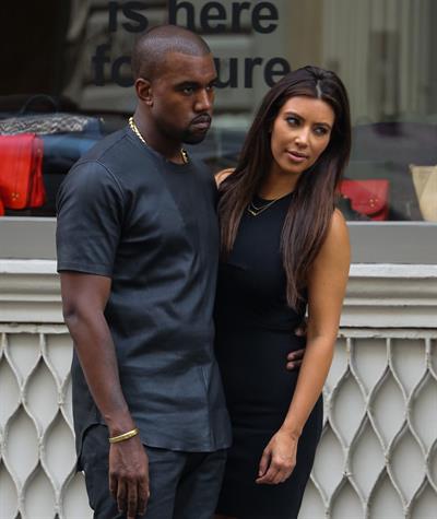 Kim Kardashian and boyfriend Kanye West walk around SoHo in New York City. They stopped at Alexander Wang to do some shopping. August 8, 2012