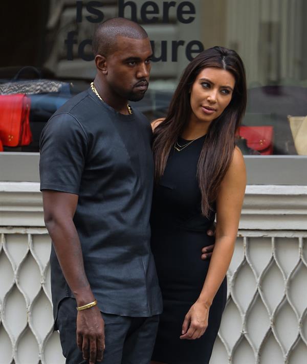 Kim Kardashian and boyfriend Kanye West walk around SoHo in New York City. They stopped at Alexander Wang to do some shopping. August 8, 2012