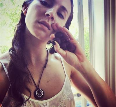 Troian Bellisario taking a selfie