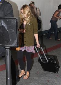 Kristen Bell - Departing on a flight at LAX - August 21, 2012