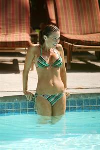 Adele Silva poolside in a bikini in Dubai on February 21, 2012