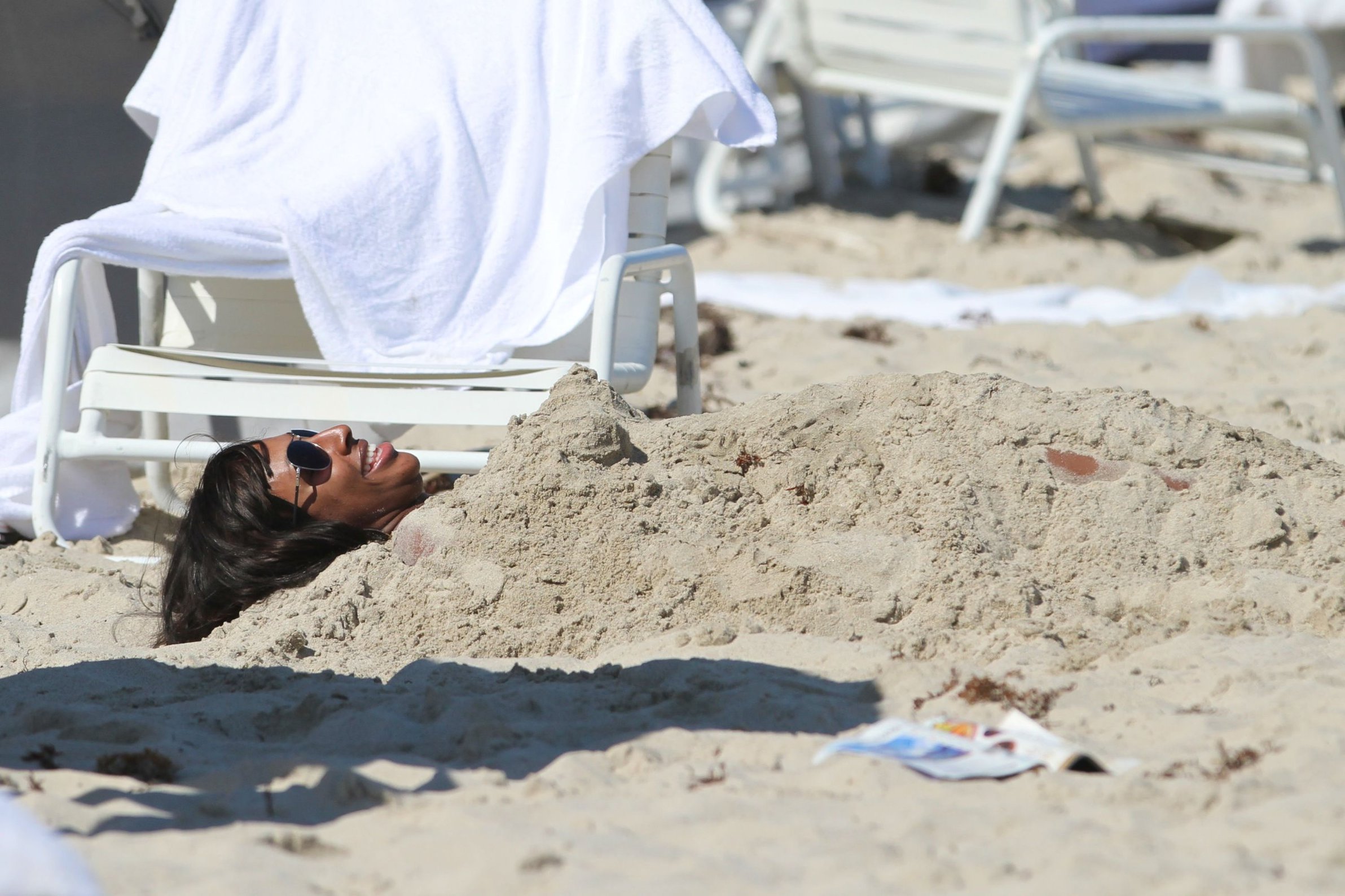 Alexandra Burke bikini candids Miami March 7, 2011 