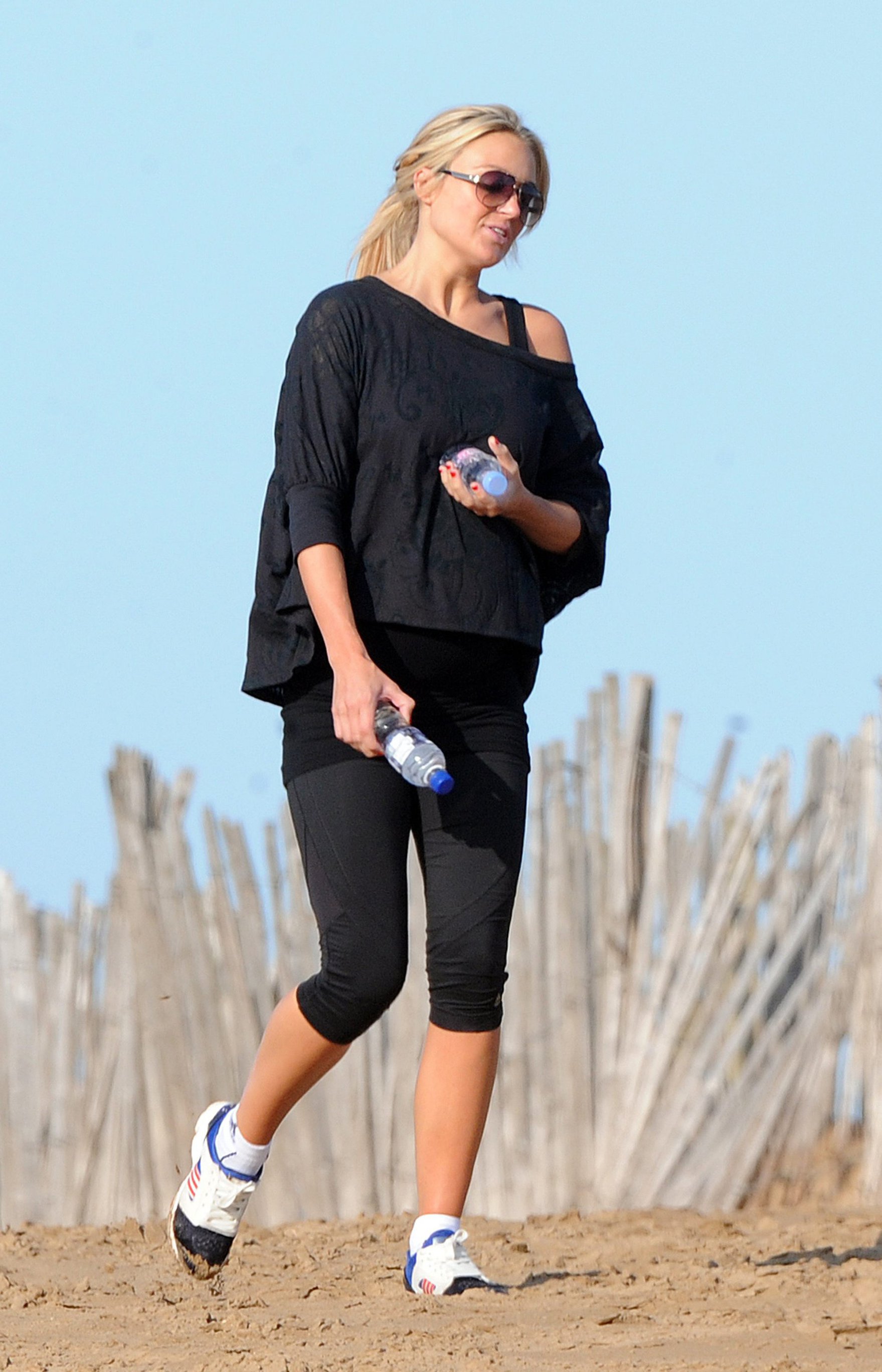 Alex Curran - Personal training session on a beach on September 19, 2011