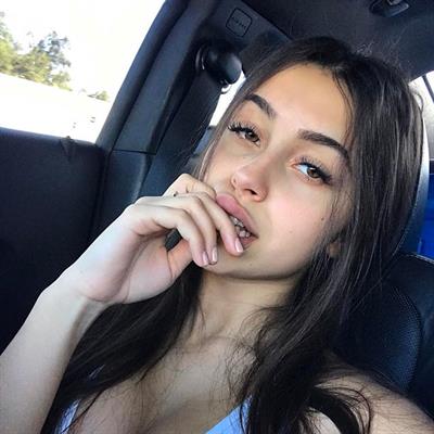 Claudia Tihan taking a selfie