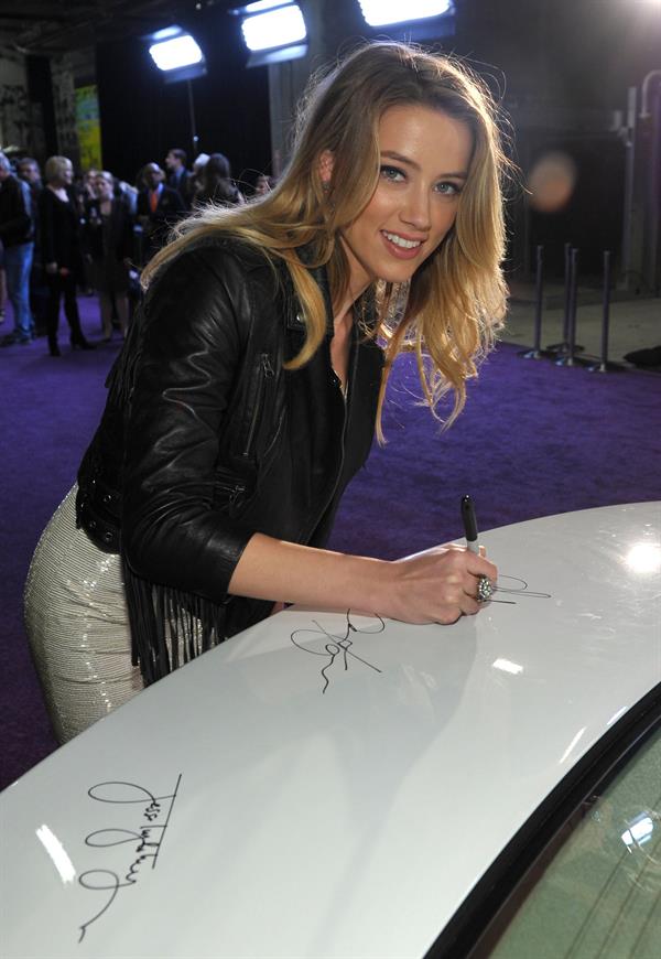 Amber Heard Vanity Fair Campaign Hollywood Pieces of Heaven art auction on February 23, 2011 