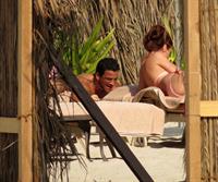 Amy Childs sunbathing with Peter Andre in Dubai on January 3, 2012