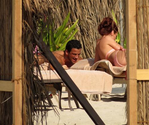 Amy Childs sunbathing with Peter Andre in Dubai on January 3, 2012