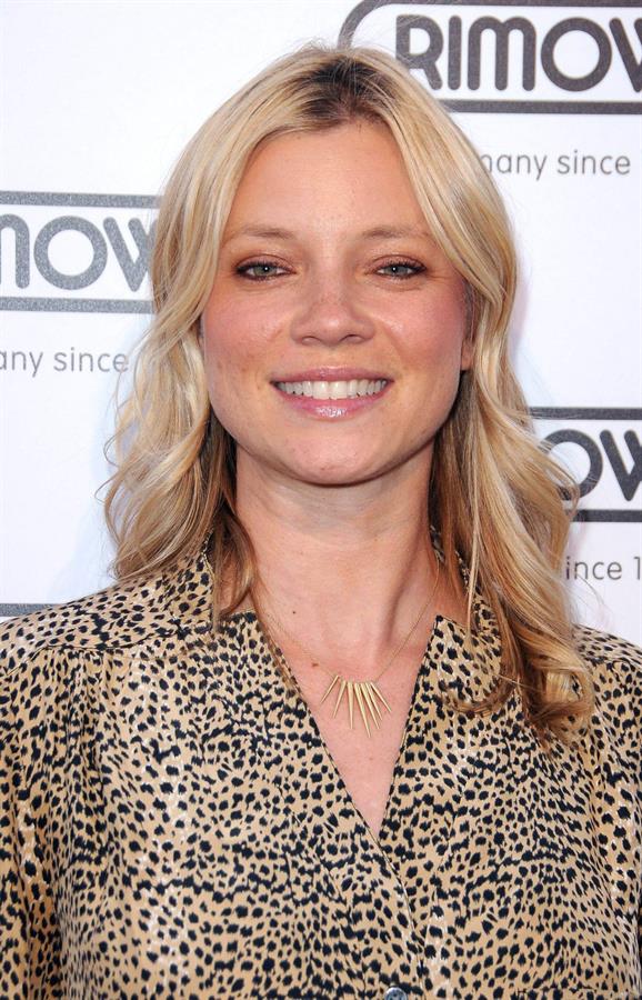 Amy Smart Rimowa New Rodeo Drive store opening party in Beverly Hills on May 16, 2011