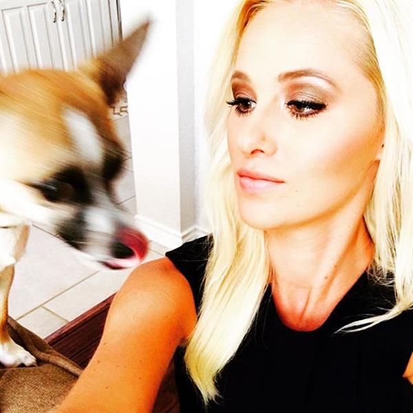 Tomi Lahren taking a selfie