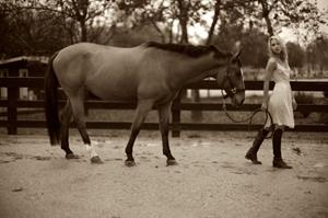 Arielle Kebbel pays tribute to her 1200 pound baby Pacific Breeze during a portrait session Los Angeles 