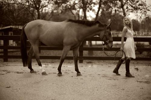 Arielle Kebbel pays tribute to her 1200 pound baby Pacific Breeze during a portrait session Los Angeles 