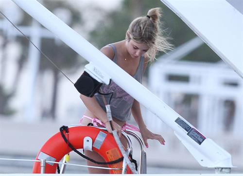 Ashley Benson bikini on a boat in Florida March 11, 2012 