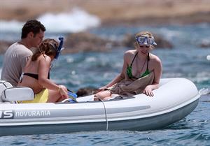 Avril Lavigne in a green bikini in Cabo, Mexico on July 27, 2012