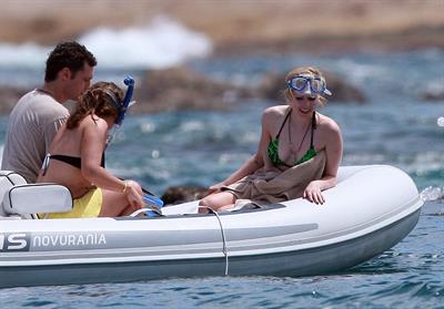 Avril Lavigne in a green bikini in Cabo, Mexico on July 27, 2012