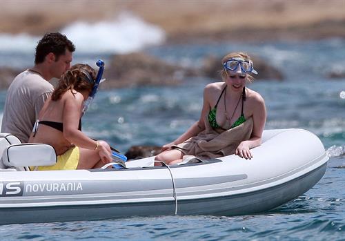 Avril Lavigne in a green bikini in Cabo, Mexico on July 27, 2012