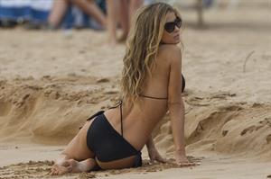 Carmen Electra – beach shoot candids in Hawaii 10/3/13  