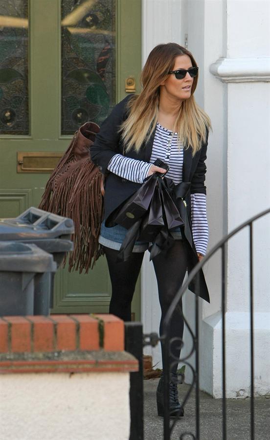 Caroline Flack leaving her London home on December 9, 2011