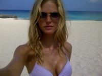 Erin Heatherton in a bikini taking a selfie