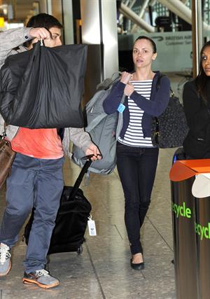 Christina Ricci With her boyfriend fly out of Heathrow Airport in London to NY - June 12, 2012
