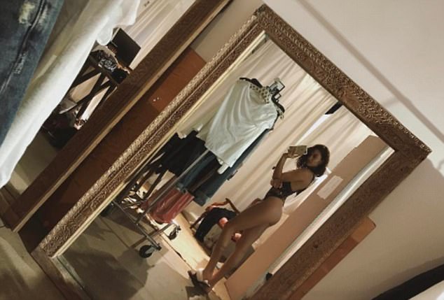 Shanina Shaik in a bikini taking a selfie