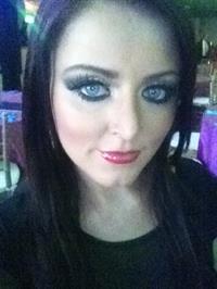 Sophie Dee taking a selfie