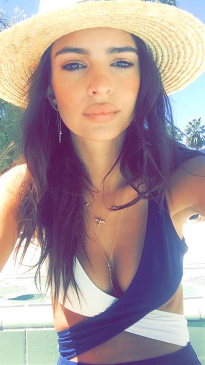 Emily Ratajkowski in a bikini taking a selfie