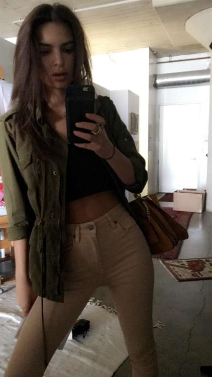 Emily Ratajkowski taking a selfie