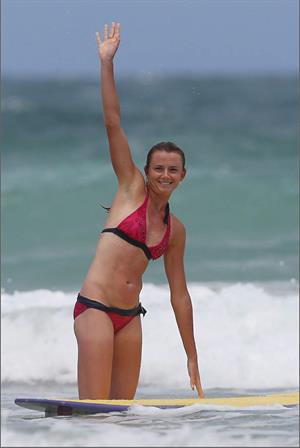 Daniela Hantuchova bikini beach surfing candids in Brisbane, Australia, December 26, 2012 