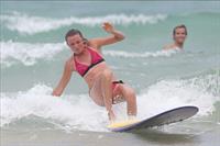 Daniela Hantuchova bikini beach surfing candids in Brisbane, Australia, December 26, 2012 