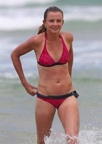 Daniela Hantuchova bikini beach surfing candids in Brisbane, Australia, December 26, 2012 