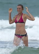 Daniela Hantuchova bikini beach surfing candids in Brisbane, Australia, December 26, 2012 