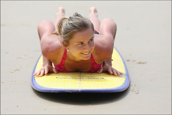Daniela Hantuchova bikini beach surfing candids in Brisbane, Australia, December 26, 2012 