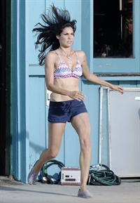 Daniela Ruah - on the set of NCIS Los Angeles in Venice Beach Sept 18, 2012
