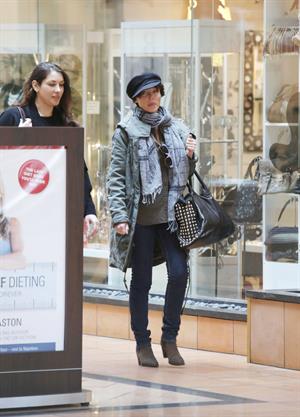 Dannii Minogue - Pictured getting a little wet while filling up on petrol - 09th August 2012