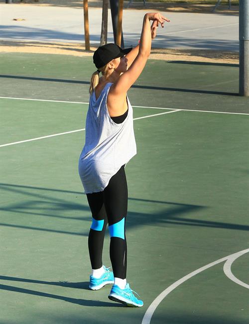 Delta Goodrem playing basketball with a friend in Los Angeles, California on November 3, 2013 