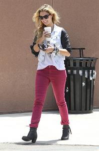 Delta Goodrem - Stopping to get a coffee on her way to work in Los Angeles, California - July 18, 2012