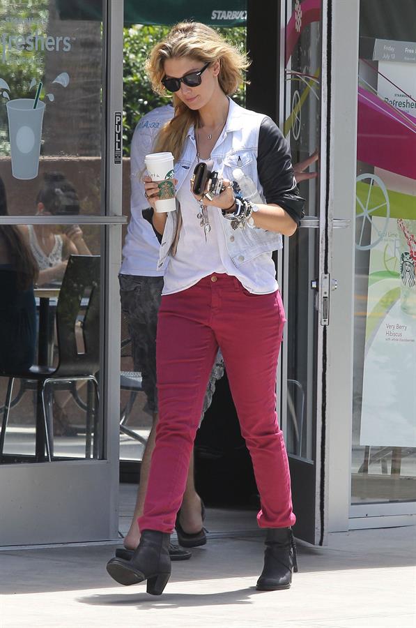 Delta Goodrem - Stopping to get a coffee on her way to work in Los Angeles, California - July 18, 2012