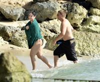 Demi Lovato and her bodyguard are spotted on the beach in Barbados April, 16 2013 