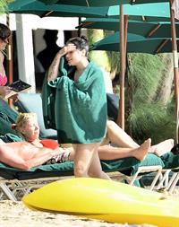 Demi Lovato and her bodyguard are spotted on the beach in Barbados April, 16 2013 