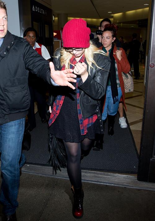 Demi Lovato Pictures Demi Lovato cute in a red touque & specs @ LA/28/12