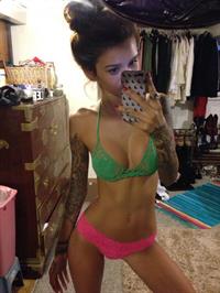 Jenah Yamamoto in a bikini taking a selfie