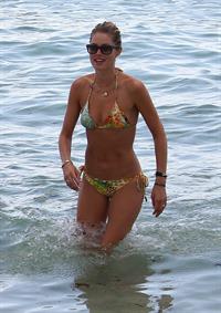 Doutzen Kroes bikini beach pictures in Miami August 16, 2012