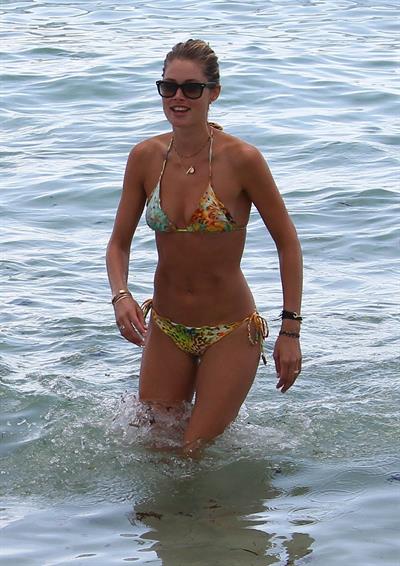 Doutzen Kroes bikini beach pictures in Miami August 16, 2012