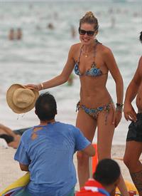 Doutzen Kroes bikini candids on the beach in Miami, Florida Augusts 15, 2012