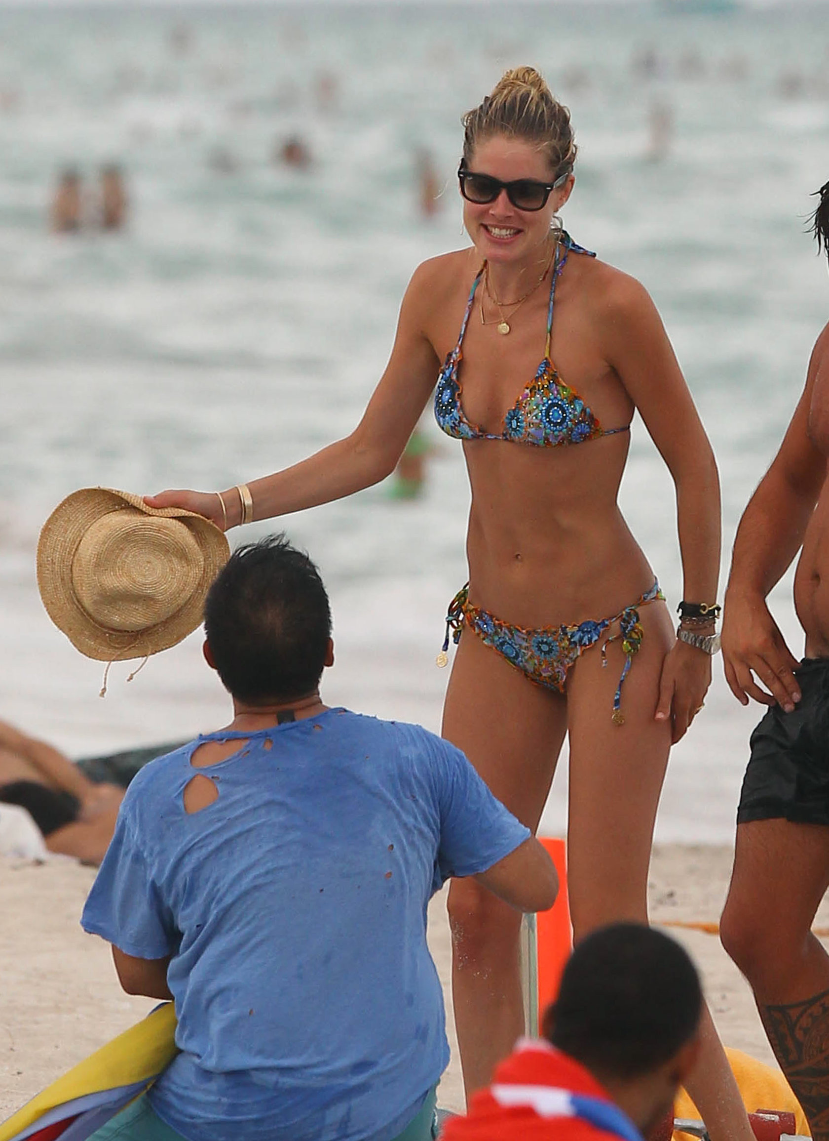 Doutzen Kroes bikini candids on the beach in Miami, Florida Augusts 15, 2012